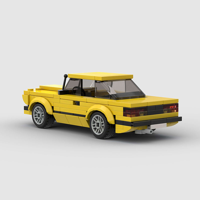 Yellow BMW 320i